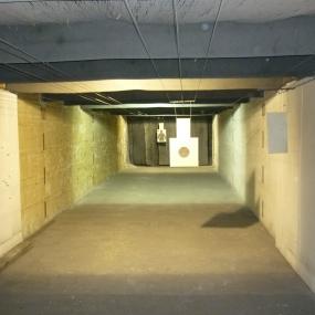 Indoor shooting range with paper targets included